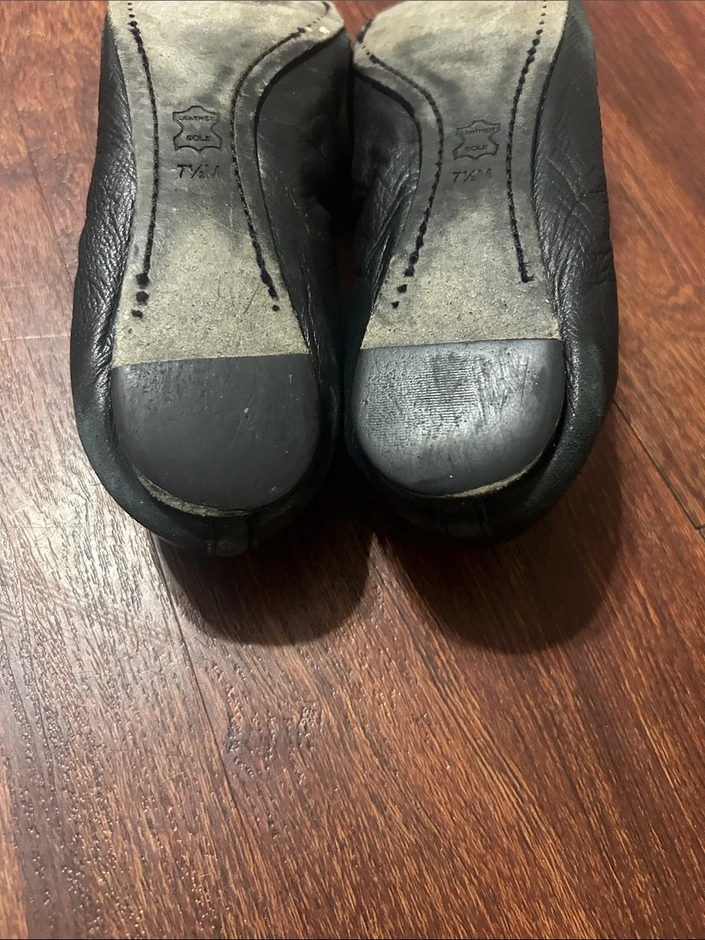 Tory Burch Black Leather Ballet Flats with Gold Logo Medallion